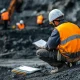 excavation worker sorting excavation permit in Sussex county